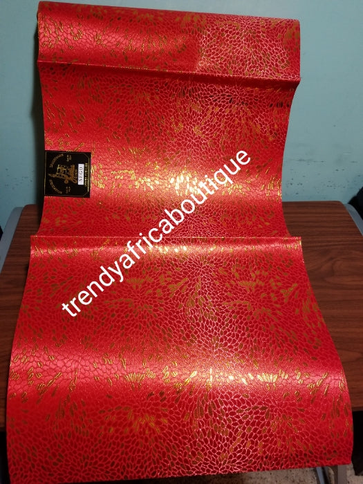 Nigerian Red/gold design Sago Gele head wrap. 2-1 pack gele. Easy to tie. 2 yds long by 19 inches wide. Classic African/Nigerian fabric for making gele (headtie) Sold per set. Price is for one set