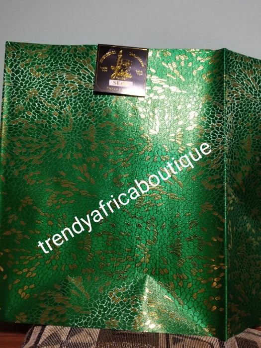 Nigerian green/gold design Sago Gele head wrap. 2-1 pack gele. Easy to tie. 2 yds long by 19 inches wide. Classic African/Nigerian fabric for making gele (headtie) Sold per set. Price is for one set