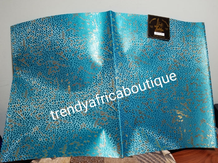 Nigerian royalblue/silver design Sago Gele head wrap. 2-1 pack gele. Easy to tie. 2 yds long by 19 inches wide. Classic African/Nigerian fabric for making gele (headtie) Sold per set. Price is for one set