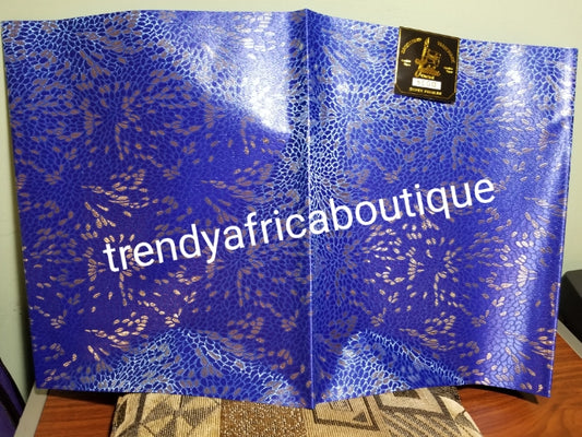 Nigerian royalblue/silver design Sago Gele head wrap. 2-1 pack gele. Easy to tie. 2 yds long by 19 inches wide. Classic African/Nigerian fabric for making gele (headtie) Sold per set. Price is for one set