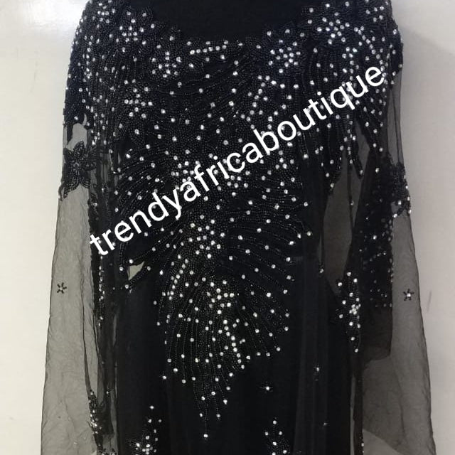 Black Heavily-beaded/crystal stones net George for making blouses. Popularly use by Igbo/Delta/edo women for big Occasions. Comes in 1.8yds lenght already design for your beautiful blouse