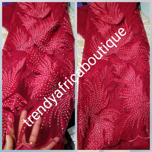 New arrival tomato Red classic French lace design. Swiss quality embellished with crystal stoned. Sold per 5yds. Nigerian french lace fabric. Rich quality for wedding dresses. For making Nigerian party dresses.