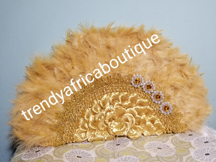 Gold Feather hand fan. Large moon shape hand fan Nigerian Bridal-accessories front and back middle design with beads and flower petal. Limited quantity. 25" long x 14" wide. Small handle to hold your fan. Very class