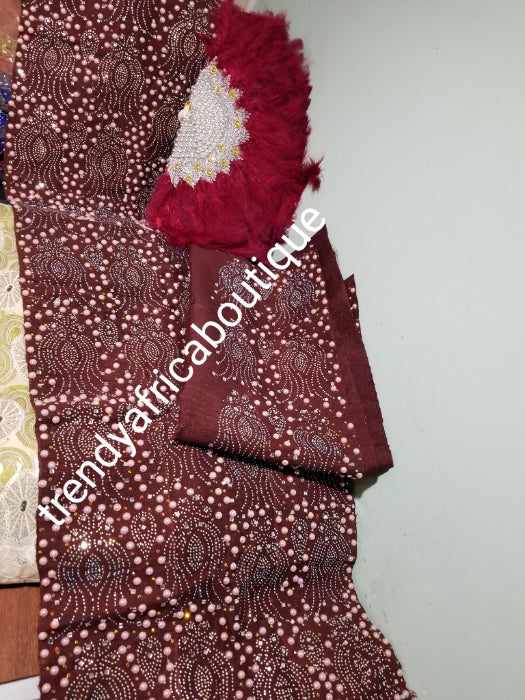 Bonus offer Wine Beaddazzled Aso-oke. 4pc wide Gele with 72" long Ipele (shoulder shawl). Can order the whole set or separately. Nigerian Celebrant Aso-oke with matching fila + feather fan  from Nigeria. All over Swarovski stone work on gele/ipele