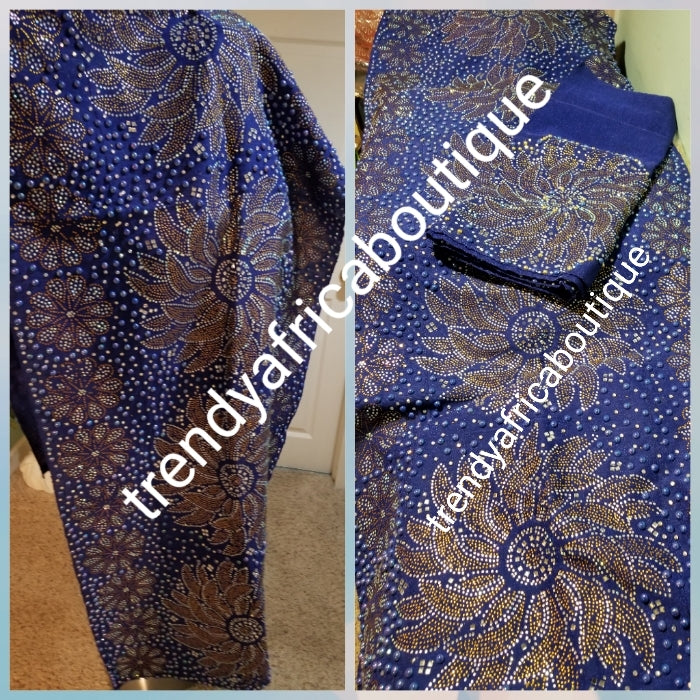 New arrival: Luxurious Celebrant royal blue Beaddazzled Aso-oke set. 4pc wide Gele with 90" long Ipele (shoulder pcs). Sold as a set. Nigerian Celebrant Aso-oke from Nigeria. Quality beaded and flower stone work. Can be made in any color. Contact us!