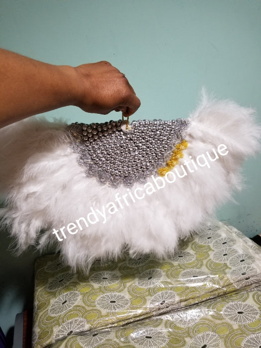 New arrival White/silver fluffy Feather hand fan. Medium size moon shape hand fan Nigerian Bridal-accessories front and back design with beads and flower petal. Limited quantity. Very classy. 22" long× 12" wide