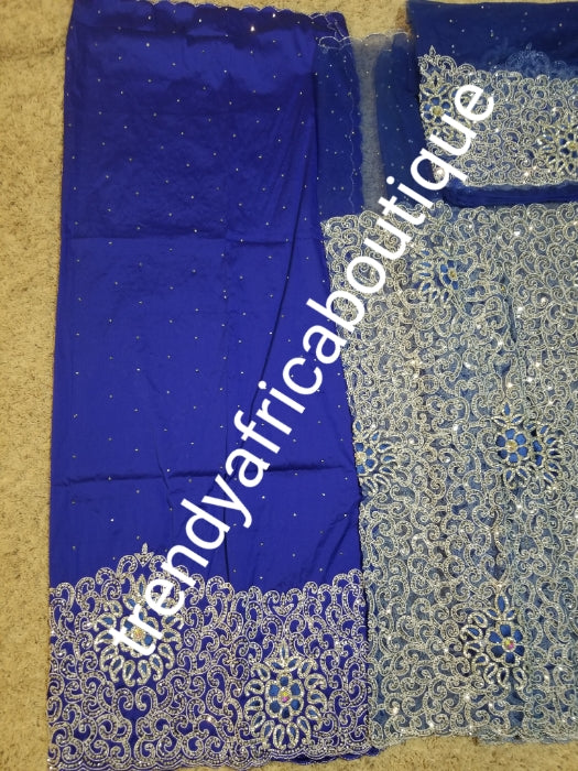 Original quality Royal blue/silver crystal hand stoned VIP celebrant George wrapper for Nigerian Ceremonies such as weddings. Igbo/Niger/ Delta/ wedding George. Set of Net + taffeta+ matching net for blouse. Breath taking crystal work!!!