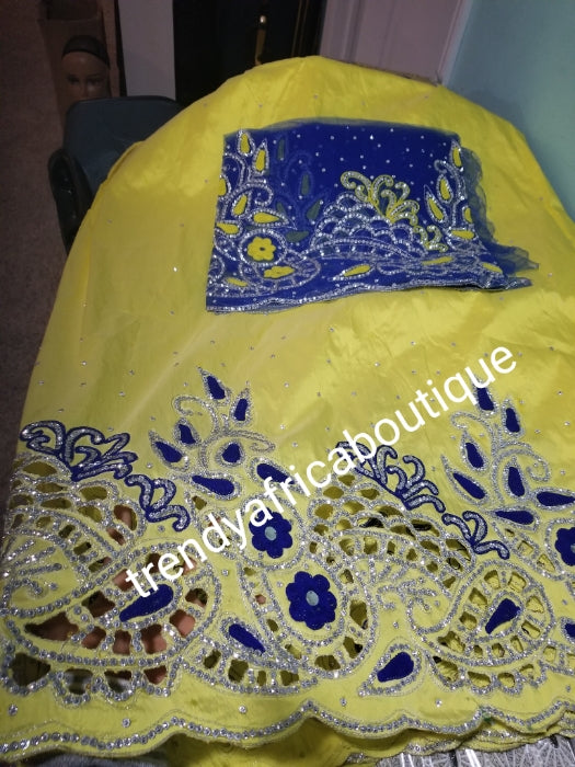 Sale: original quality Taffeta Silk George wrapper: quality yellow George/royal blue contrast  blouse. Embellished with crystal stones for Nigerian traditional wedding/party outfit. Come as 2.5yds+2.5yds +1.8yds matching net. Aso-ebi order available