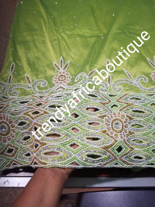 Sale: Quality Lemon Green Taffeta Silk George wrapper: hand cut border beaded and silver crystal stoned for Nigerian traditional wedding/party outfit. Come as 2.5yds+2.5yds +1.8yds matching net for blouse. best Indian-george.