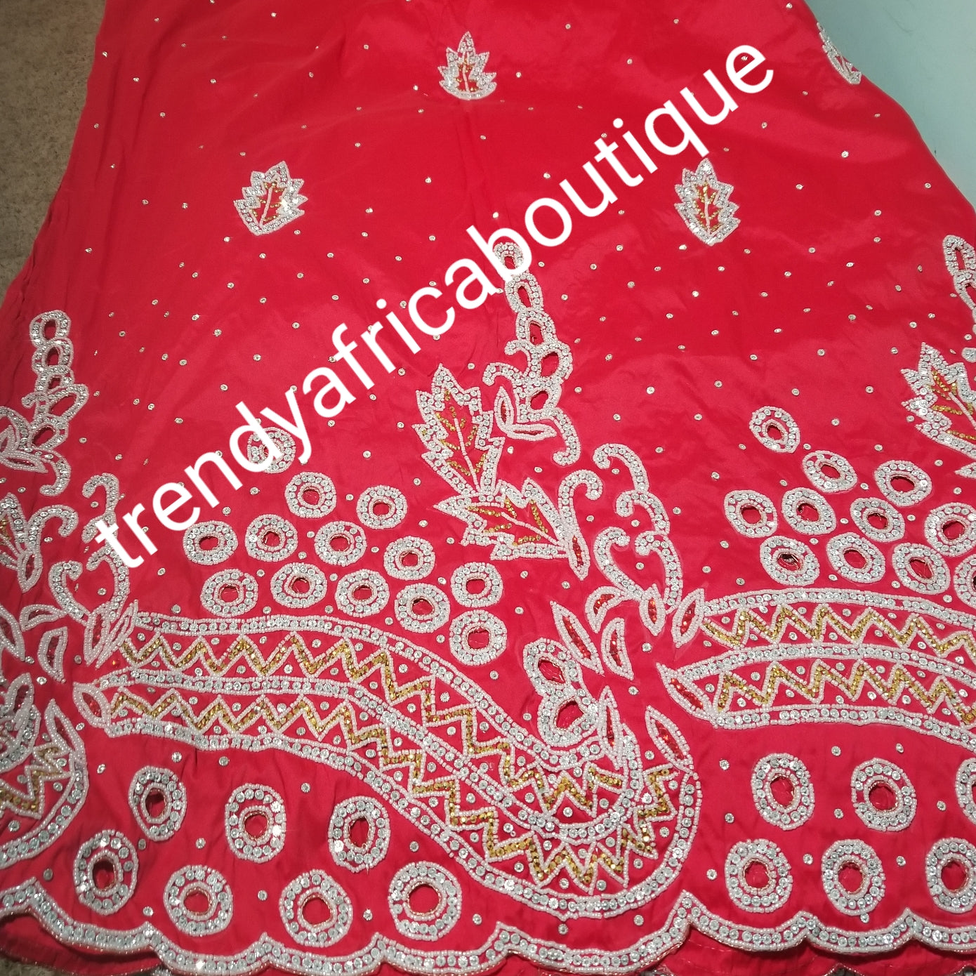 Sale: original quality Taffeta Silk George. Red George Embellished with silver crystal stones for Nigerian traditional wedding/party outfit. Come as 2.5yds+2.5yds +1.8yds matching net. Aso-ebi order available