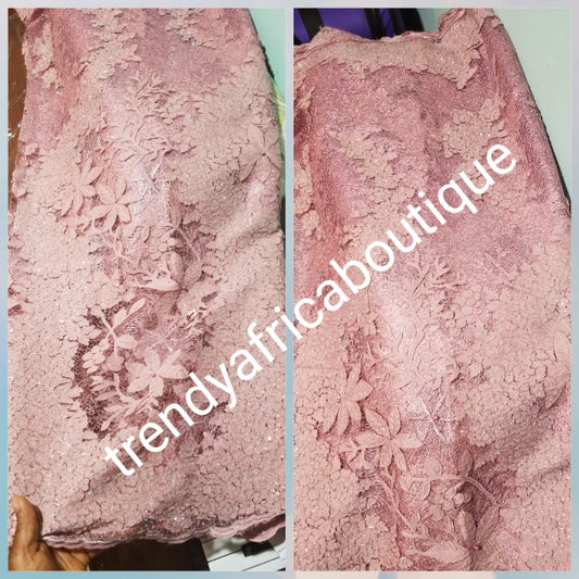 New arrival Onion pink French lace design. Swiss quality embellished with crystal stoned. Sold per 5yds. Nigerian french lace fabric. Rich quality for wedding dresses. For making Nigerian party dresses.