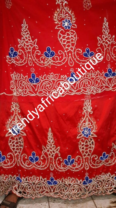 New arrival Beautiful Red taffeta with royal blue velver patches.High quality Hand Stoned silk George wrapper for Nigerian/Igbo/delta/Akwa Ibom Traditional outfit. Sold as 5yds wrapper + 1.8yds  complimentary net for blouse.