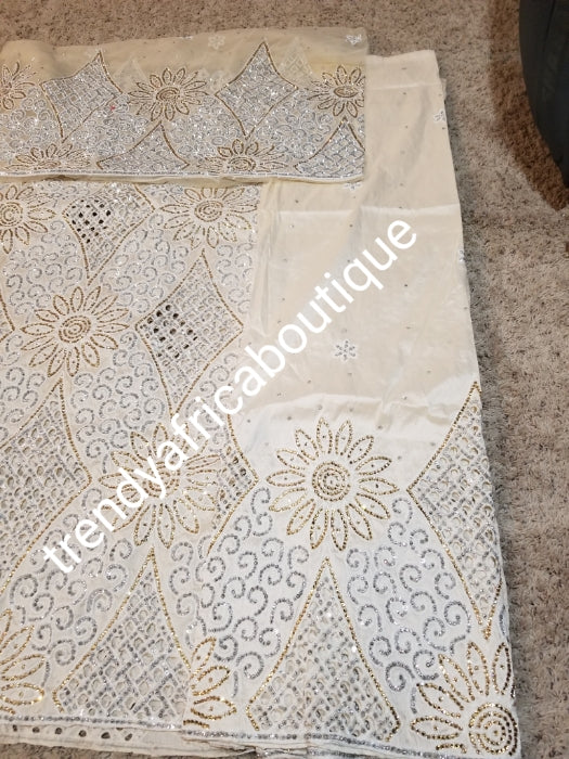Sale sale: Beige hand cut embriodery + crystal stones Silk George wrapper and matching net blouse. Classic Cream George, All Crystal stones to perfection. 2 wrapper of 2.5yds each and 1.8yds blouse. Nigerian madam George/Igbo Delta women