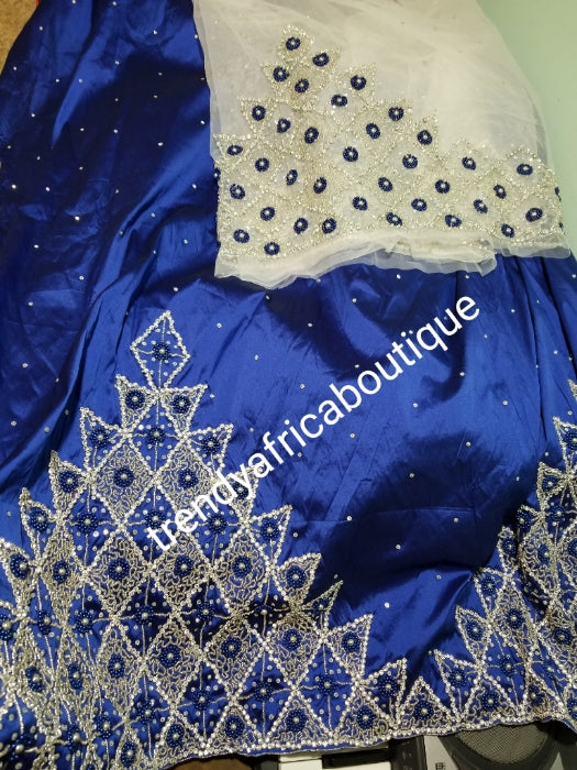 Clearance: Quality taffeta silk George wrapper. Royal blue + white contrast blouse embellished with all over  silver crystal stones and beads. Nigerian traditional wedding George wrapper for, Delta/Igbo/Edo weddings. This is 5yds + 1.8yds blouse