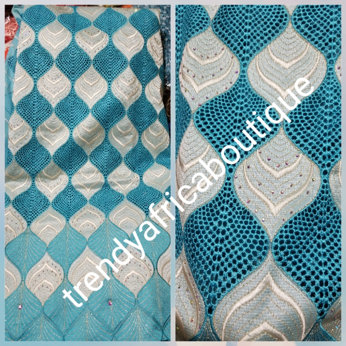 Special offer with matching headtie + Original Swiss Embriodery Lace fabric embellished with clear crystal stones. White/turquoise blue. Great quality and texture. Sold per 5yds. Price is for 5yds