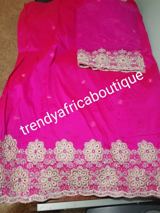 Sale: New arrival Nigerian Tranditional wedding George wrapper. Embellished with quality dazzling beads/crystal stones. Classic fuschia pink. Full 5yds + 1.8yds matching blouse + free headtie. Indian-George. Model shown wearing similar fabric