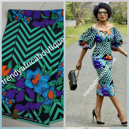 Green with flower border 100% veritable cotton Ankara wax print fabric. Sold per 6yds. Price is for 6yds. Soft texture. Excellent quality for making fabulous African outfit