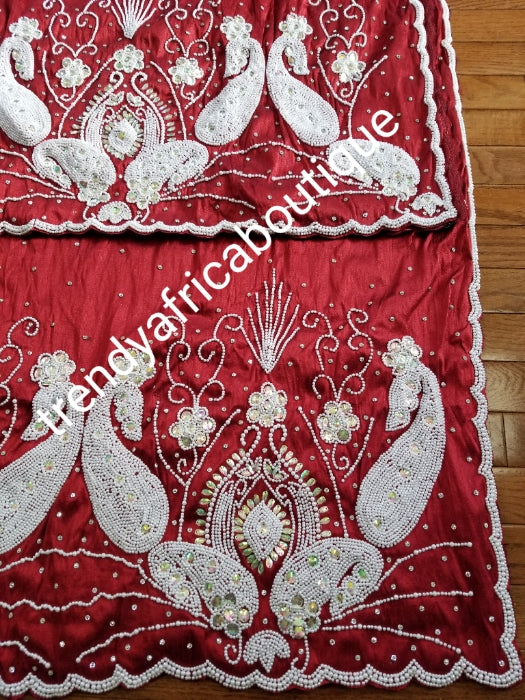 New arrival Superior Quality VIP maroon taffeta. Nigerian Traditional wedding George Wrapper/matching net blouse. Sold 2.5yd + 2.5yds wrapper and 1.8yds blouse fabric for making blouse. All over Finest Quality white beads and Crystal stone hand work
