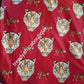Red/white Quality Isi-agu Igbo traditional/ceremonial fabric for men or womem. Tiger head fabric. Sold per one yard. Price is for a yard. Can be use for wrapper, blouse or shirt for men.