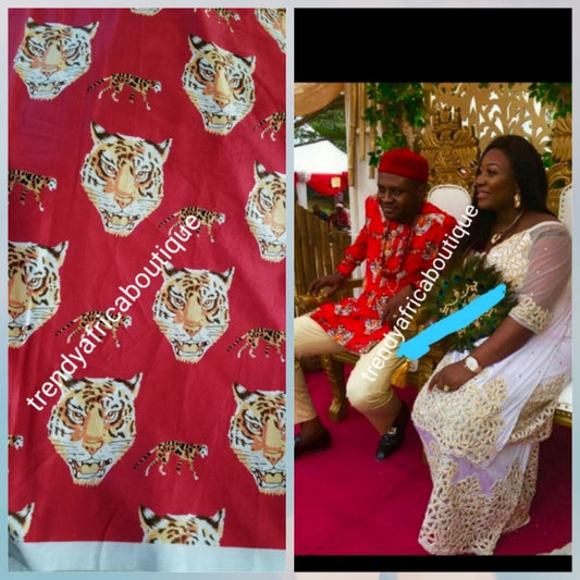 Red/white Quality Isi-agu Igbo traditional/ceremonial fabric for men or womem. Tiger head fabric. Sold per one yard. Price is for a yard. Can be use for wrapper, blouse or shirt for men.