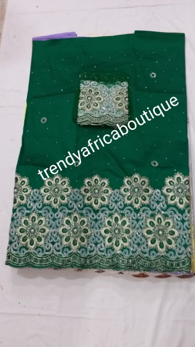 Sale: New arrival Nigerian Tranditional wedding George wrapper. Embellished with quality dazzling beads/crystal stones. Classic Nigerian Green. Full 5yds + 1.8yds matching blouse + free headtie. Indian-George. Model shown wearing similar fabric