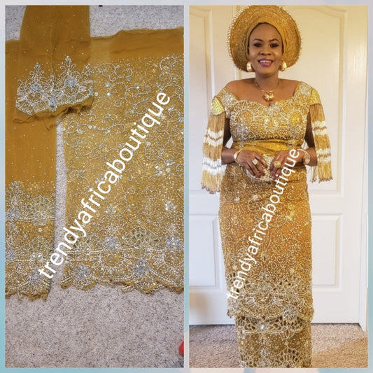 Produce-per-order Gorgeous hand beaded and stoned Igbo Traditonal Bridal wedding George Wrapper and matching net blouse. Full 2.5yds hand stoned + 2.5yds border stoned work + 1.8yds matching net blouse. 3-4 weeks to produce any color of your choice