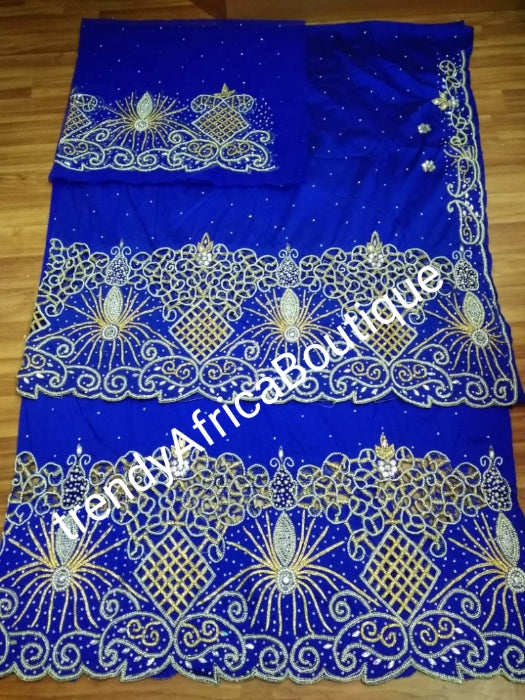 Ready to ship: Royalblue 1st lady Nigerian big Celebrants VIP hand Stoned with dazzling Crystal stones George wrapper. 2.5yds + 2.5yds + 1.8 yds matching net blouse. Exclusive handcut design for Igbo/delta women or men outfit