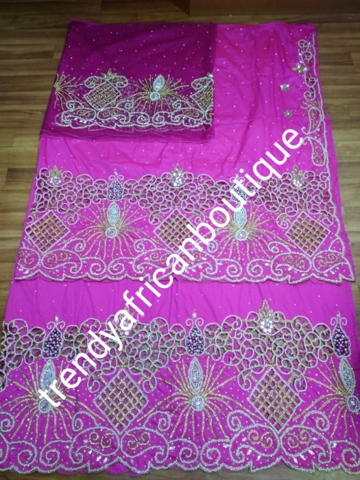 Ready to ship: Fuschia pink 1st lady Nigerian big Celebrants VIP hand Stoned with dazzling Crystal stones George wrapper. 2.5yds + 2.5yds + 1.8 yds matching net blouse. Exclusive handcut design for Igbo/delta women or men outfit