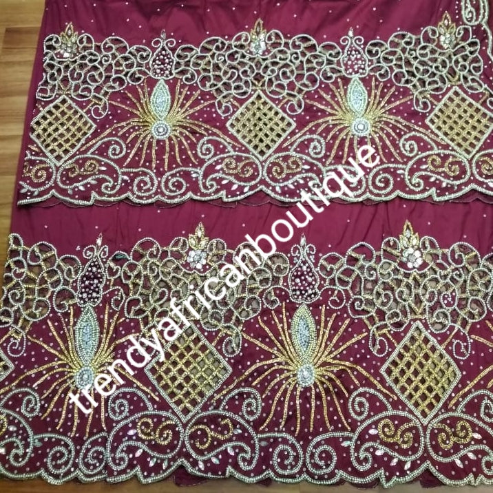 Ready to ship: Wine Nigerian first lady  big Celebrants VIP hand Stoned with dazzling Crystal stones George wrapper. 2.5yds + 2.5yds + 1.8 yds matching net blouse. Exclusive handcut design for Igbo/delta women or men outfit