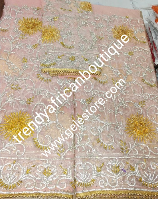 Sweet Peach VIP Madam Net George wrapper for Nigerian bridal/Celebrant wrapper. Heavily embellished with silver and gold crystal on 2.5yds+ 2.5yds + 1.8yds matching net for blouse . Sold as a set. Special occasion George
