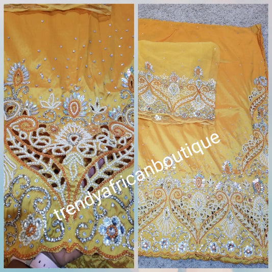 Musterd yellow first lady hand beaded and stoned Nigerian traditional George wrapper with matching blouse. Niger/Delta/Igbo women Georges. Quality George wrapper for high society party. Come as 5yds +1.8yds matching net for blouse
