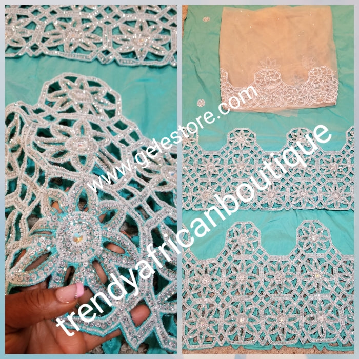 Ready to ship:Mint green/peach blouse Quality taffeta Silk George wrapper embellished with dazzling Crystals and beaded to perfection for IIgbo/Niger/Delta women Red carpet events. Sold as  2 wrapper + 1.8yds Net for blouse. You will love the quality!