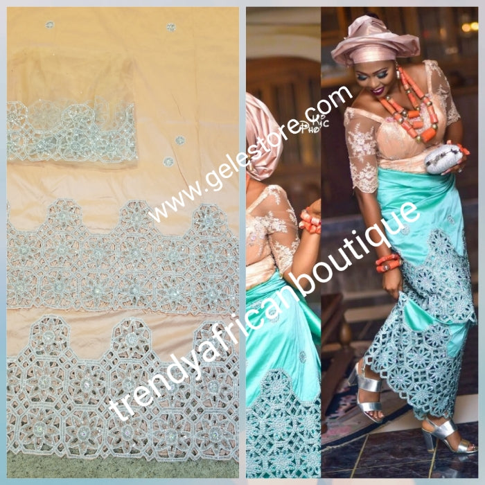Ready to ship: Peach/peach blouse Quality taffeta Silk George wrapper embellished with dazzling Crystals and beaded to perfection for IIgbo/Niger/Delta women Red carpet events. Sold as 2 wrapper + 1.8yds Net for blouse. You will love the quality!