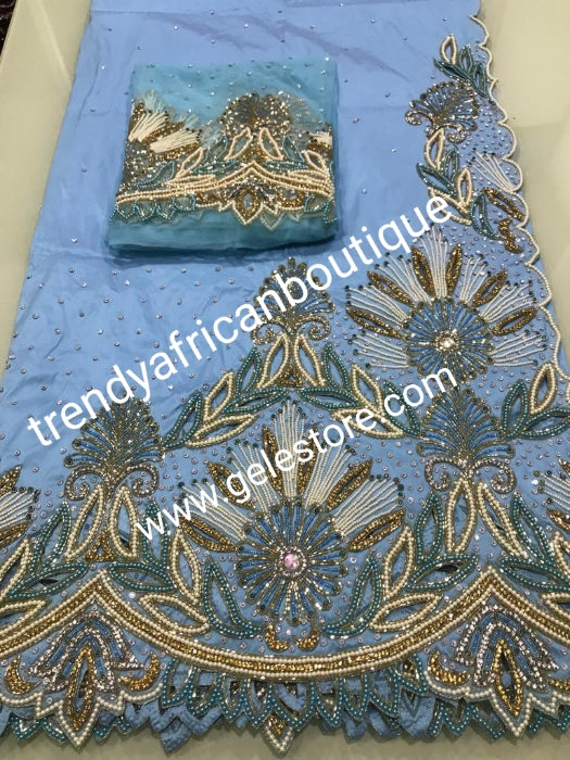 Sale: sky blue first Lady/VIP hand beaded and stoned Nigerian traditional Celebrant George with matching blouse. Niger/Delta/Igbo women Georges. Exclusive Side beaded design wrapper, Sold as a set of 2 wrapper +1.8yds matching net for blouse