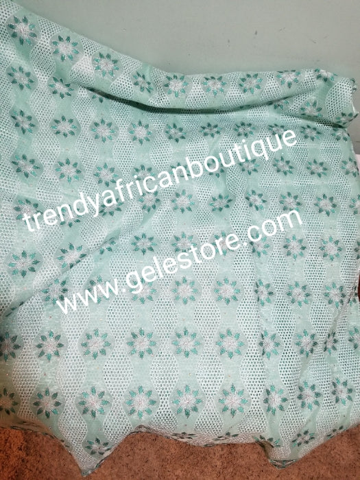 Clearance  Give away price: Mint green Double organza  Swiss Embriodery Lace fabric with clear crystal stones. Great quality and texture. Sold per 5yds. Price is for 5yds. African lace for making party outfit. Unisex color