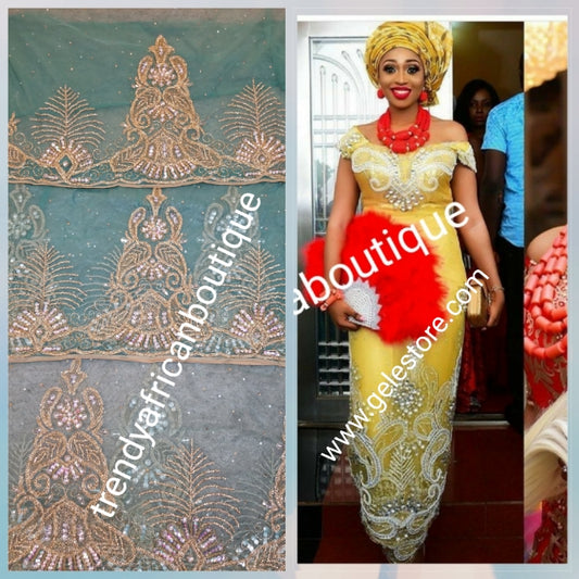 Ready to Ship: Gorgeous Igbo Traditional Bridal outfit- in mint green net George wrapper and matching net for blouse. embellished with dazzling Crystal stones all over. 2 wrapper + 1.8yds net for blouse. Classic green net Ideal for making Celebrant outfit