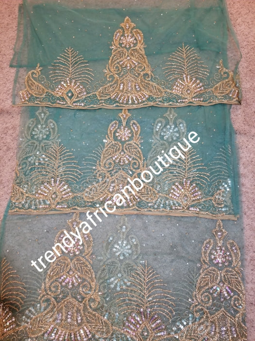Ready to Ship: Gorgeous Igbo Traditional Bridal outfit- in mint green net George wrapper and matching net for blouse. embellished with dazzling Crystal stones all over. 2 wrapper + 1.8yds net for blouse. Classic green net Ideal for making Celebrant outfit