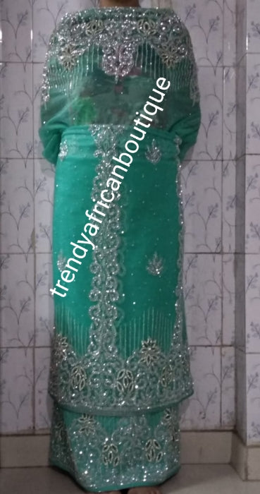 Ready to ship. Sweet mint green color VIP Madam Net//taffeta George wrapper for Nigerian Bridal outfit. All over silver sparkling crystal stoned 2.5yds taffeta+ 2.5yds net + 1.8yds matching net for blouse. Sold as a set. Nigeria traditional weddings/event