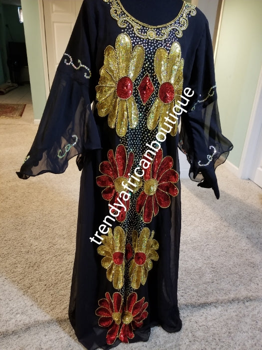 Ready to ship: Black dubai kaftan  dress. free flowing embellished with Multi sequence front and back dress to perfection. Availablein size, ,L, and XXL.. Chiffon includes headtie. 60' long