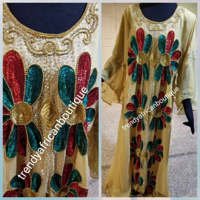 Ready to ship: Beige dubai kaftan  dress. free flowing embellished with Multi color sequence front and back dress to perfection. Availablein size, M,L,XL. Chiffon includes headtie. 60' long
