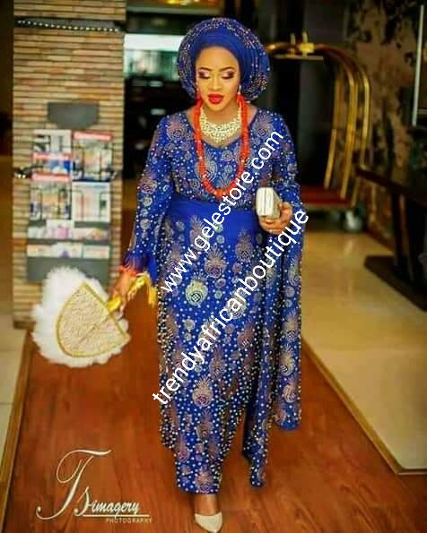 4pcs Bead-dazzled with Swarovski stone work. Lateast design Celebrant Aso-oke set. Custom-made. Made-to-order only. Nigerian traditional wedding outfit. Allow 6-8 weeks for processing time. 4ps wrapper, blouse, gele/ipela all beaddazzled from mother land