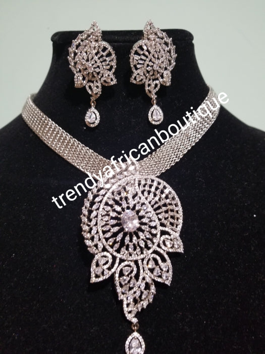 2pcs 22k quality  white/silver electroplating in choker set. Sold as a set. Pendant is mounted with crystal CZ diamond stones. Top quality/hypo allergenic plating. Bold pendant with 17" long necklace