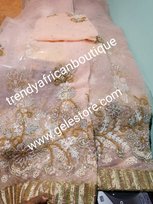 Ready to ship. Sweet Peach net George. perfect stone work for traditional Bridal outfit. Quality beaded and dazzling crystal stoned on a  net George wrapper. 2.5yds + 2.5yds + 2yds.fabric. Sold as a set, price is for a set.