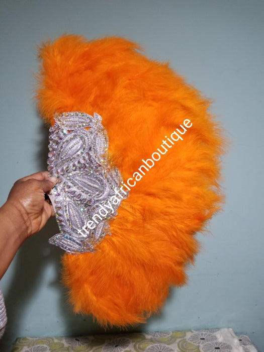 Clearance Orange Feather hand fan. Medium front and back design moon shape hand fan Nigerian  Bridal-accessories front and back  design with gold beads and flower petal. Limited quantity. 19" long + 14" wide. Small handle to hold your fan. Very classy
