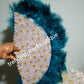 Ready to ship teal green Feather hand fan.front and back design. Medium size moon shape.  Bridal-accessories design with gold beads and flower petal. Limited quantity.