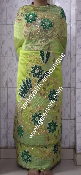 Ready to ship. Exclusive design sweet Lemon green Madam/celebrant Nigerian George wrapper.  2.5yds + 2.5yds + 1.8yds matching net  for blouse. Tradtional Igbo/Delta Bridal outfit. Lemon Taffeta with Olive green velvet accent