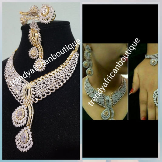 Back in stock- Special price: New arrival Celebrants 4pcs matching set of 22k Gold Electroplated with CZ silver  stones setting. Quality piece of accessories, hypoallergenic. Necklace, earrings, ring and bangle set.