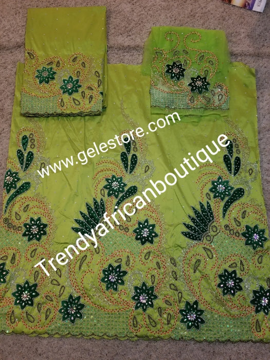 Ready to ship. Exclusive design sweet Lemon green Madam/celebrant Nigerian George wrapper.  2.5yds + 2.5yds + 1.8yds matching net  for blouse. Tradtional Igbo/Delta Bridal outfit. Lemon Taffeta with Olive green velvet accent