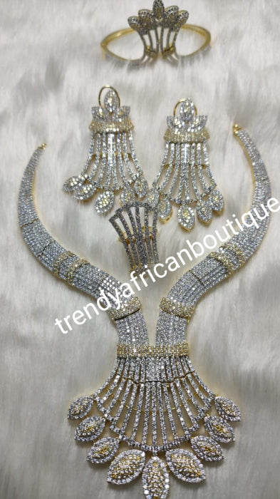 Sale: New arrival Celebrants 4pcs Bridal set: 22k  Electroplated with dazzling white/gold CZ stones setting. Bridal piece of accessories, hypoallergenic. Necklace, earrings, ring Is open for finger adjustment and a matching bangle set.