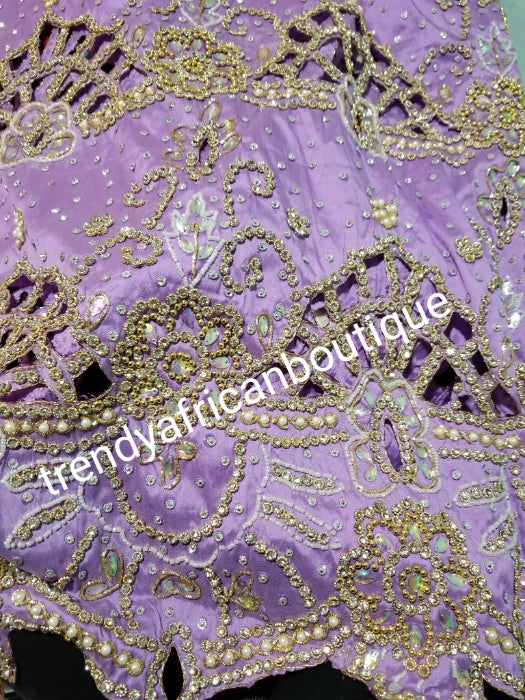 Ready to Ship: Gorgeous Igbo Traditional Bridal outfit- quality Lilac  net + Taffeta George wrapper embellished with dazzling Crystals all over. 2 wrapper + 1.8yds net for blouse. Ideal for making Celebrant outfit. Model show wearing Gold Net